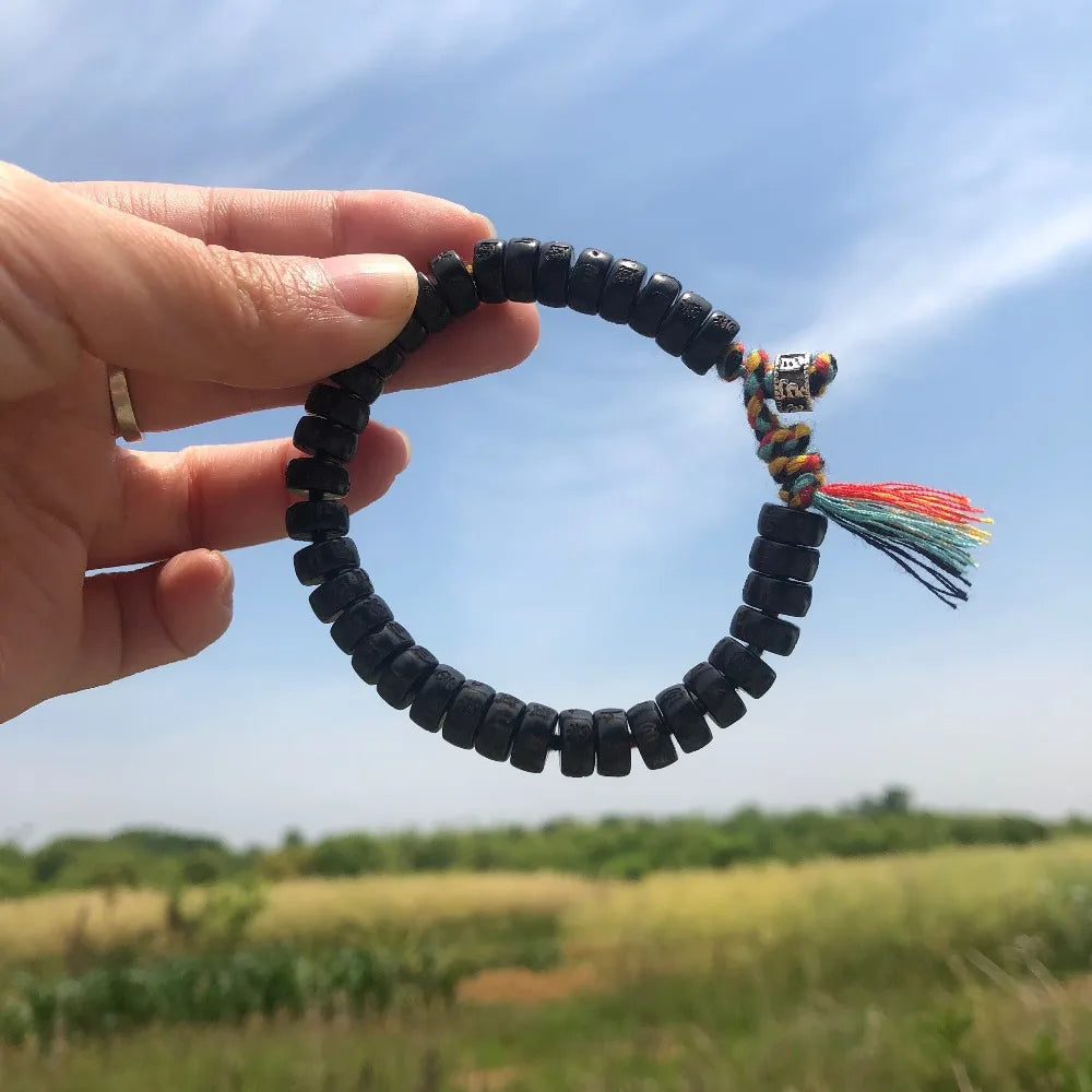 Pulsera de coco con Om Mani Padme Hum