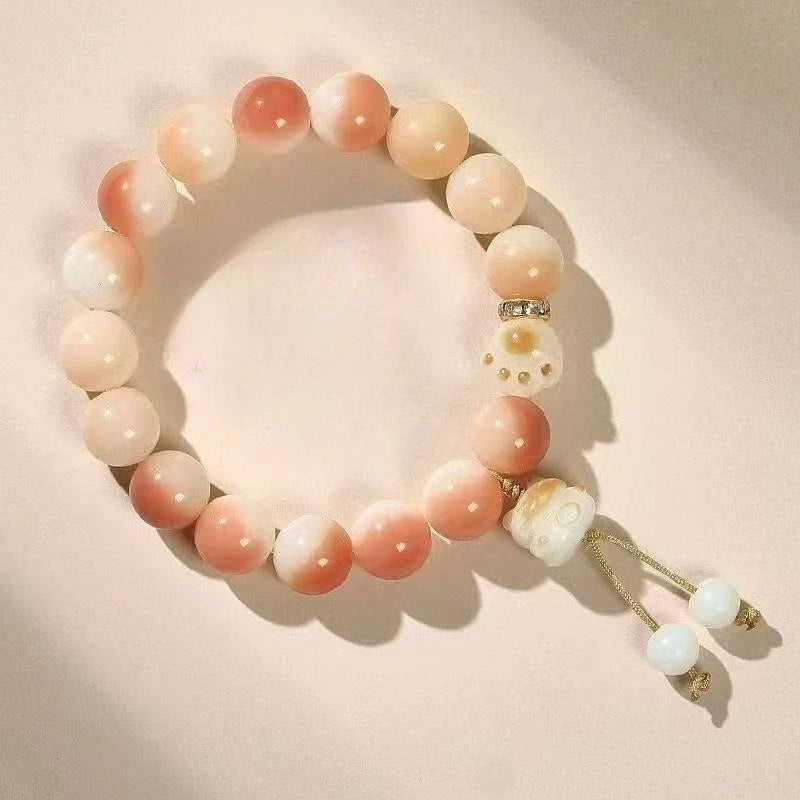 Pulsera Huella Felina · Cuentas Bodhi