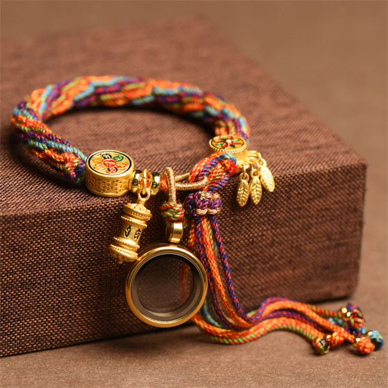 Pulsera Rueda de Oración · Cordón Multicolor