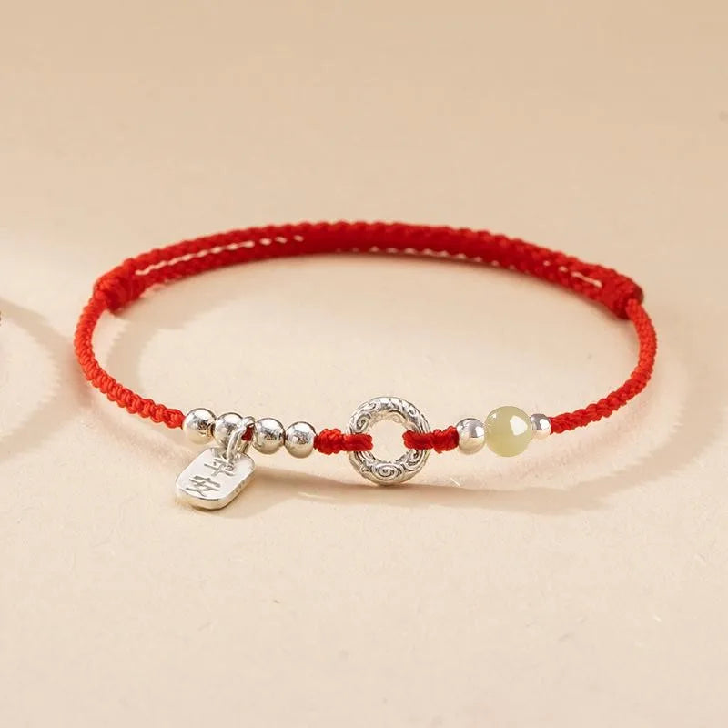 Pulsera roja con círculo de inspiración jade