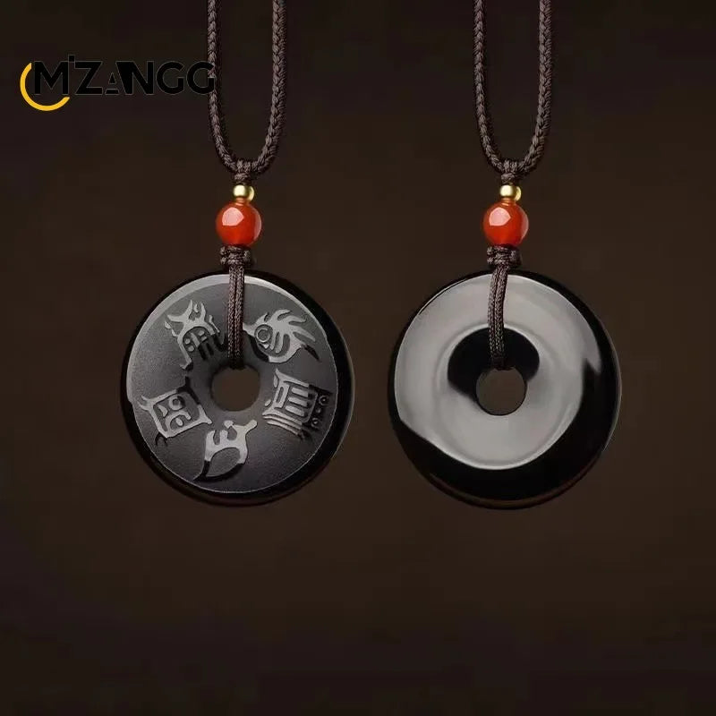 Colgante taoísta de obsidiana grabada