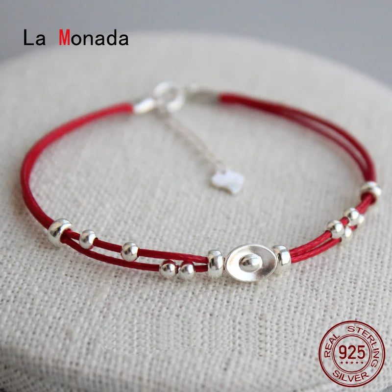 Pulsera de cordón rojo con lingote