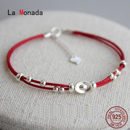 Pulsera de cordón rojo con lingote