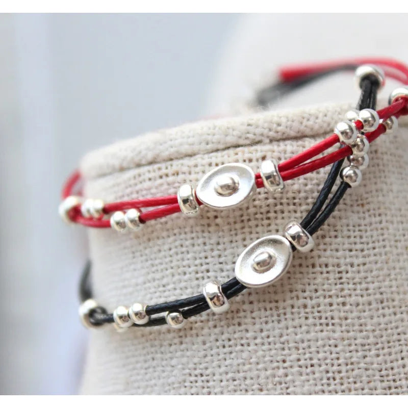 Pulsera de cordón rojo con lingote