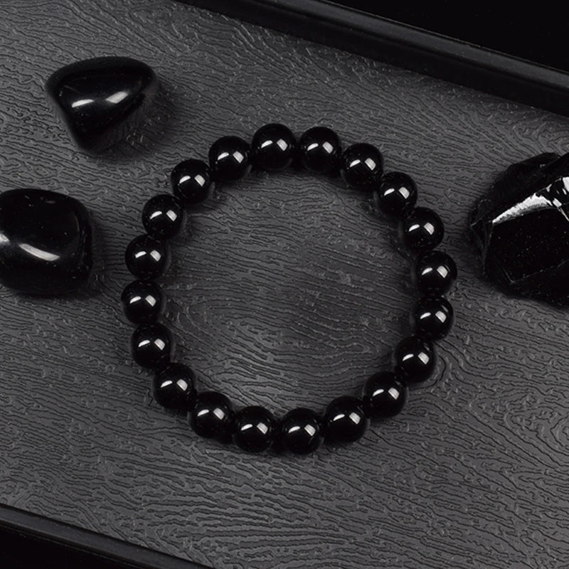 Pulsera Umbra · Cuentas Pulidas