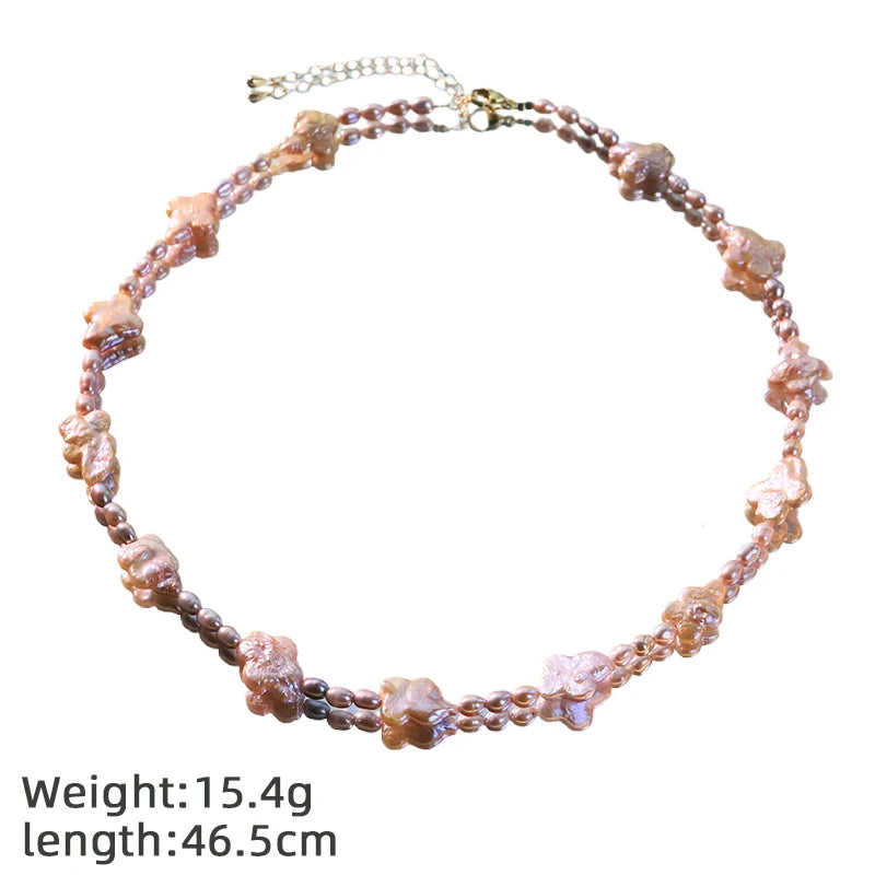 Conjunto de collar y pulsera de perlas y trébol