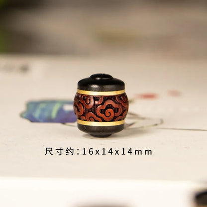 Ébano natural de sândalo vermelho lobular incrustado com contas de cobre em formato de barril