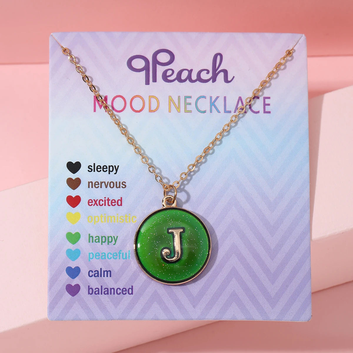 Collar de inicial termocrómica