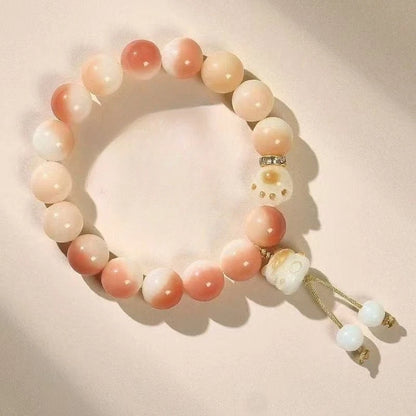 Pulsera Huella Felina · Cuentas Bodhi