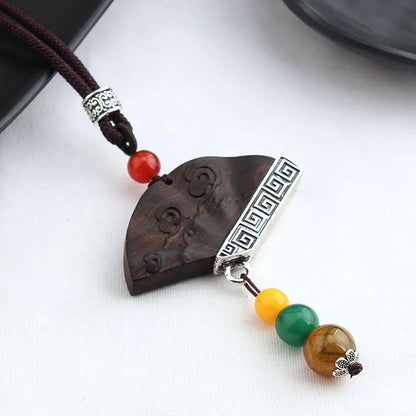 Colar longo com pingente de madeira de ébano, estilo chinês, feito à mão, com design retro, para mulheres, ideal para usar com blusas de tricô, com cordão encerado, joia de estilo étnico boho, para uso diário.