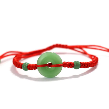 Pulsera roja con círculo de imitación jade