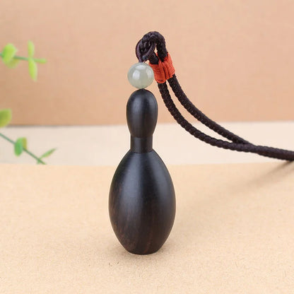 Colar com pingente de caixa vazada em madeira de ébano chinesa, tecido à mão, com motivos étnicos, corrente para suéter, medalhão para guardar notas, pó ou amuleto, joia unissex.