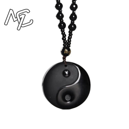 Colgante Bagua de obsidiana tallada