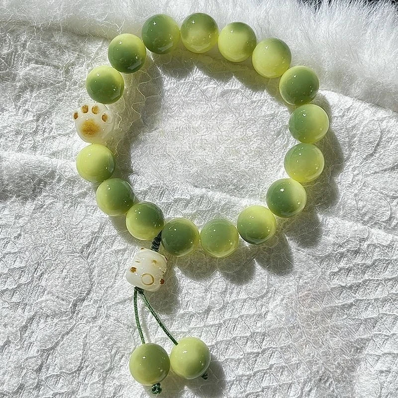 Pulsera Huella Felina · Cuentas Bodhi