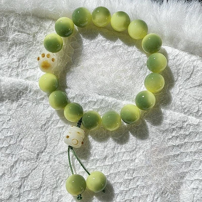 Pulsera Huella Felina · Cuentas Bodhi