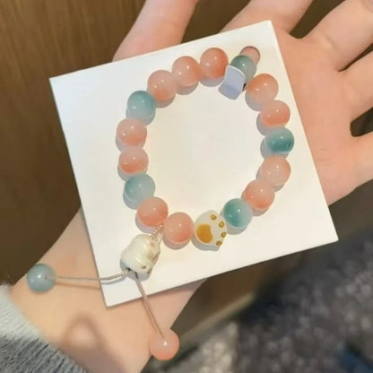 Pulsera Huella Felina · Cuentas Bodhi