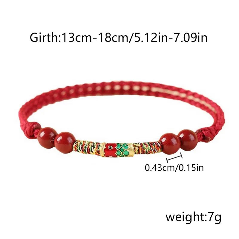 Pulsera roja con pez koi decorativo