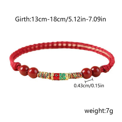 Pulsera roja con pez koi decorativo