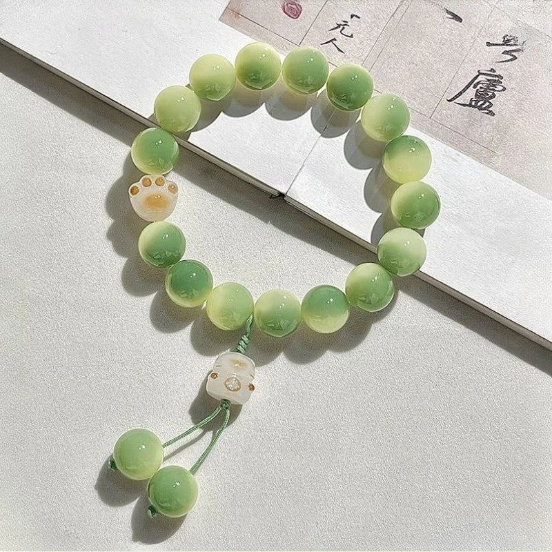 Pulsera Huella Felina · Cuentas Bodhi
