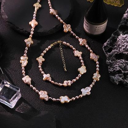 Conjunto de collar y pulsera de perlas y trébol