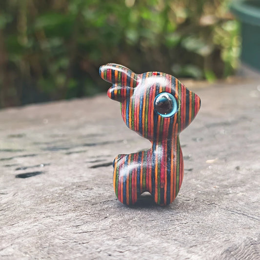 Figura Ciervo Arcoíris: Miniatura. Diseño y acabado de la pieza mostrada.