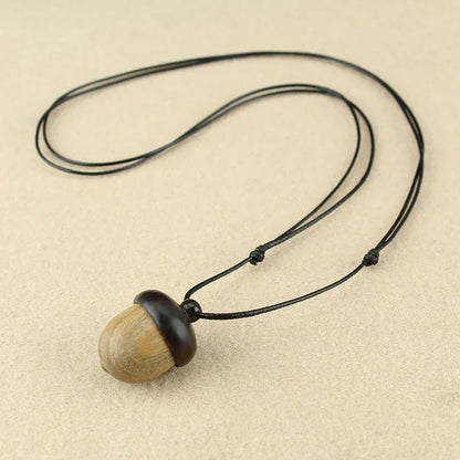 Novo criativo colar pinha retro ébano bolota pingente caixa arte design colar pingente rotativo desejando garrafa acessório