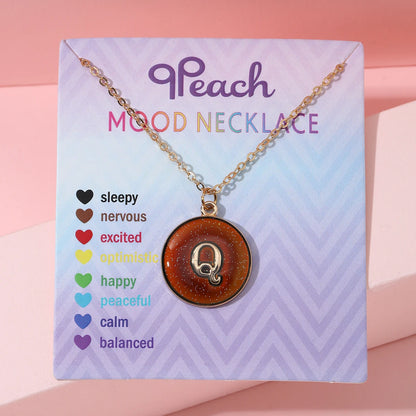 Collar de inicial termocrómica