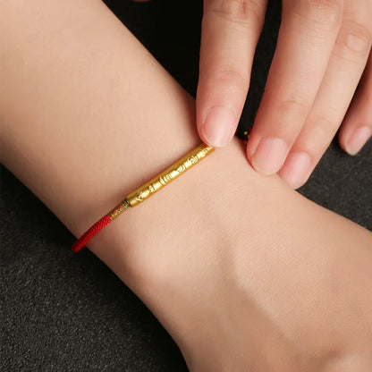 Pulsera de cordón rojo con mantra tibetano