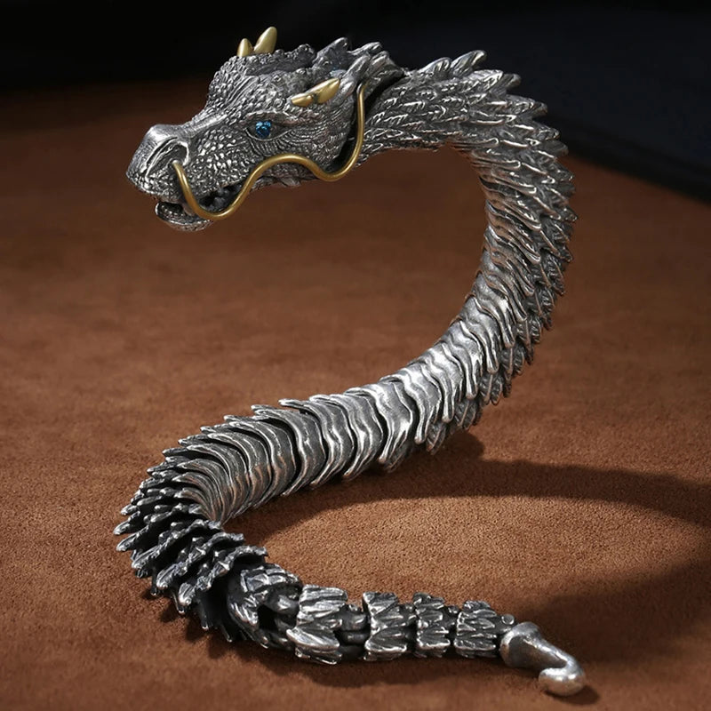 Pulsera Drako: Escamas Metálicas. Diseño y acabado de la pieza mostrada.