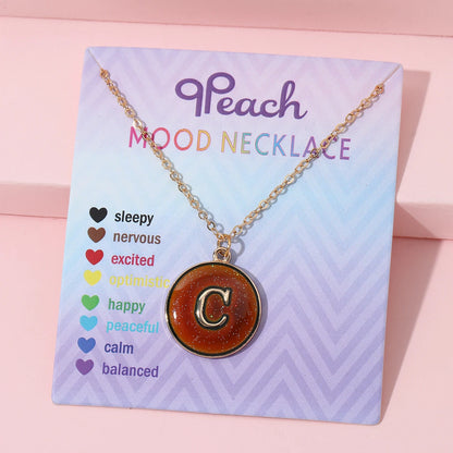 Collar de inicial termocrómica