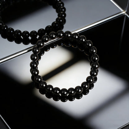 Pulsera Medianoche · Cuentas Pulidas