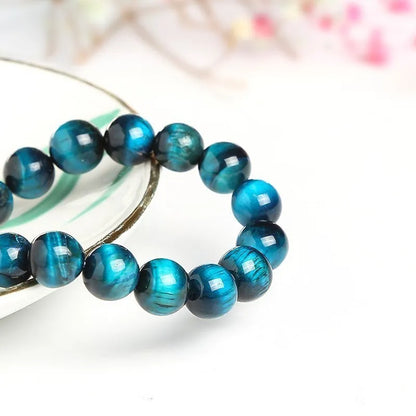 Pulsera de ojo de tigre azul redonda