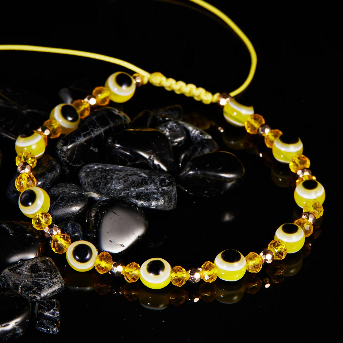 Pulsera trenzada de cristal con ojo turco