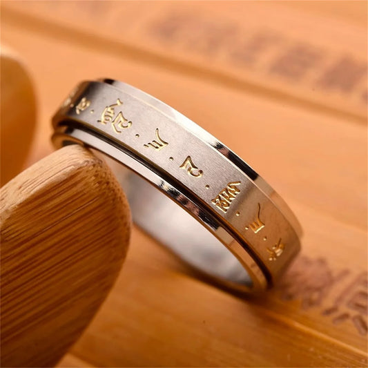 Anillo giratorio budista de acero