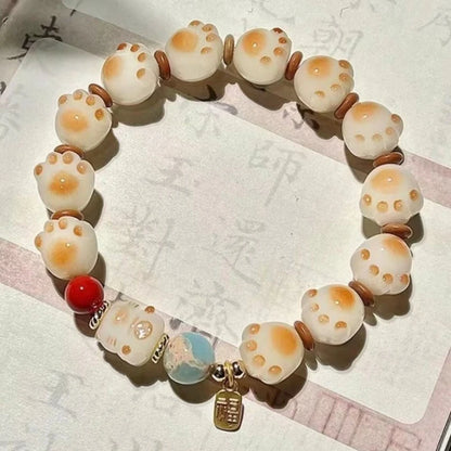 Pulsera Huella Felina · Cuentas Bodhi