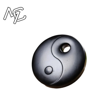Colgante Bagua de obsidiana tallada