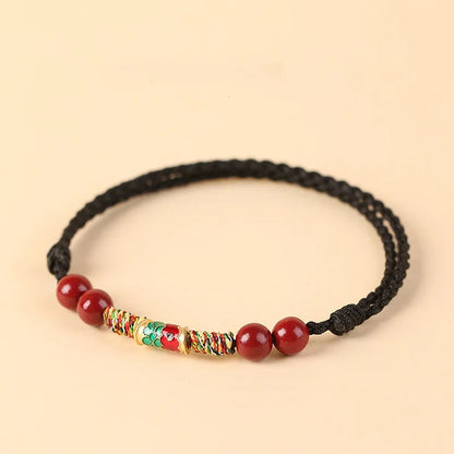 Pulsera roja con pez koi decorativo