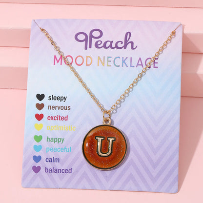 Collar de inicial termocrómica