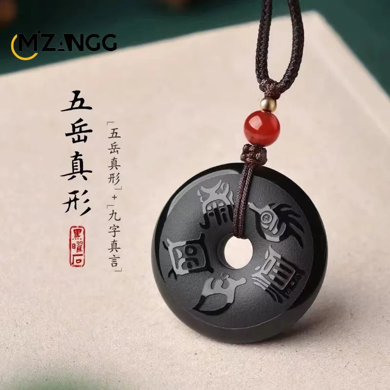 Colgante taoísta de obsidiana grabada