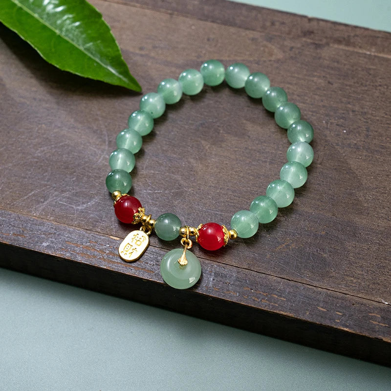 Pulsera Carmesí · Cuentas y Colgante