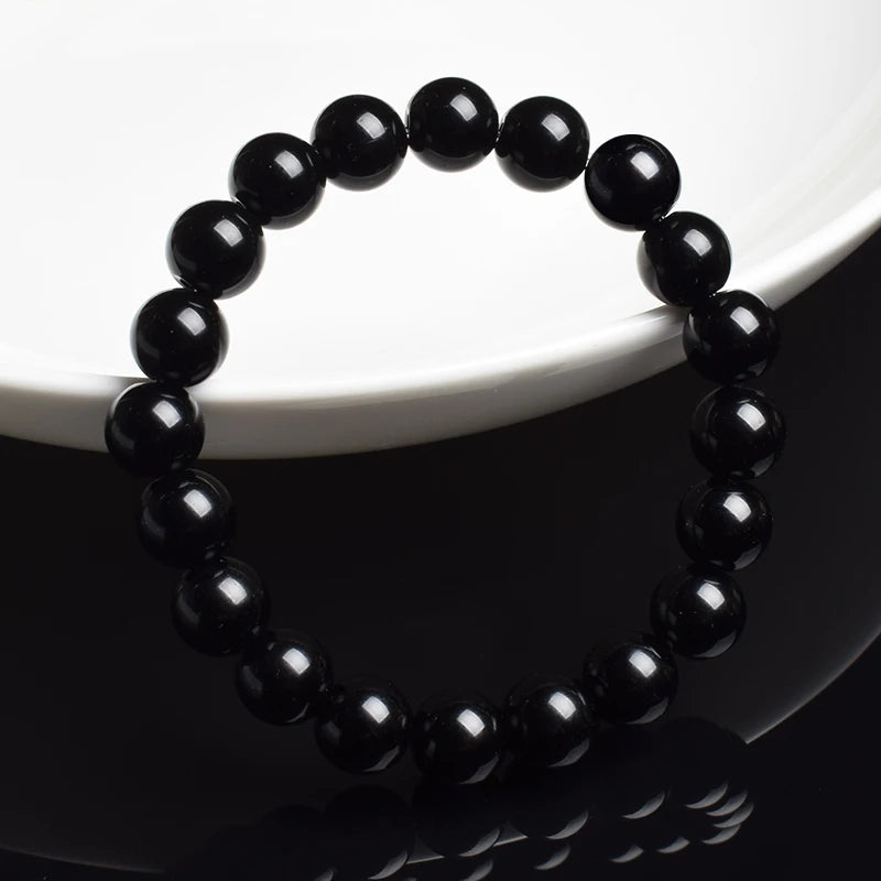 Pulsera Umbra · Cuentas Pulidas