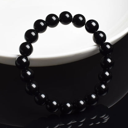 Pulsera Umbra · Cuentas Pulidas