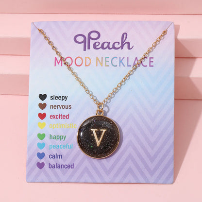 Collar de inicial termocrómica