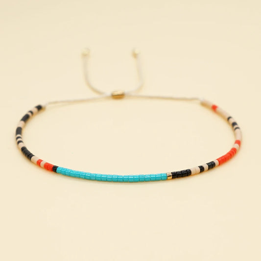 Pulsera Mosaico Fino: Abalorios de Color. Diseño y acabado de la pieza mostrada.