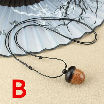 Novo criativo colar pinha retro ébano bolota pingente caixa arte design colar pingente rotativo desejando garrafa acessório