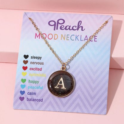 Collar de inicial termocrómica