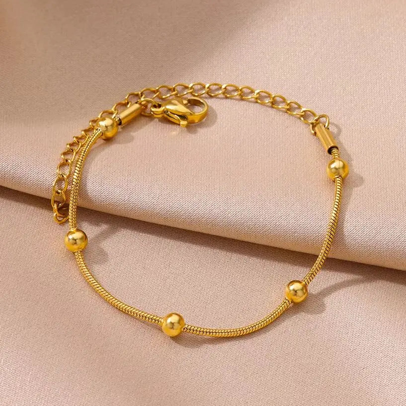 Pulsera Áurea: Cadena Dorada. Diseño y acabado de la pieza mostrada.