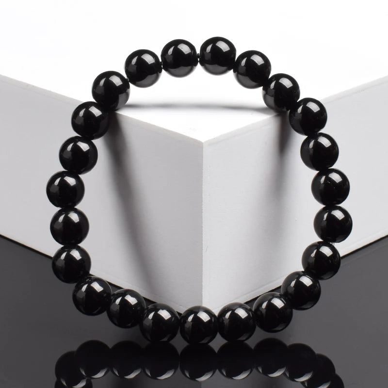 Pulsera Umbra · Cuentas Pulidas