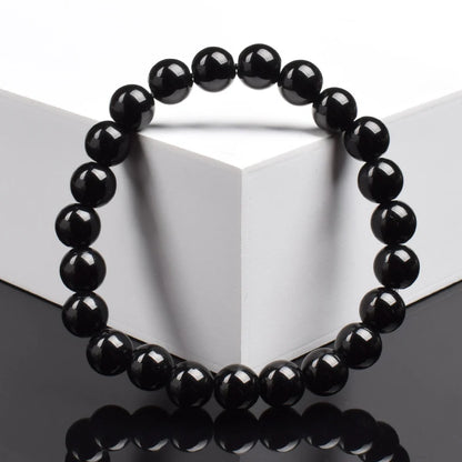 Pulsera Umbra · Cuentas Pulidas
