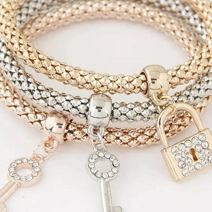 Set Tríada · Pulseras con Dijes